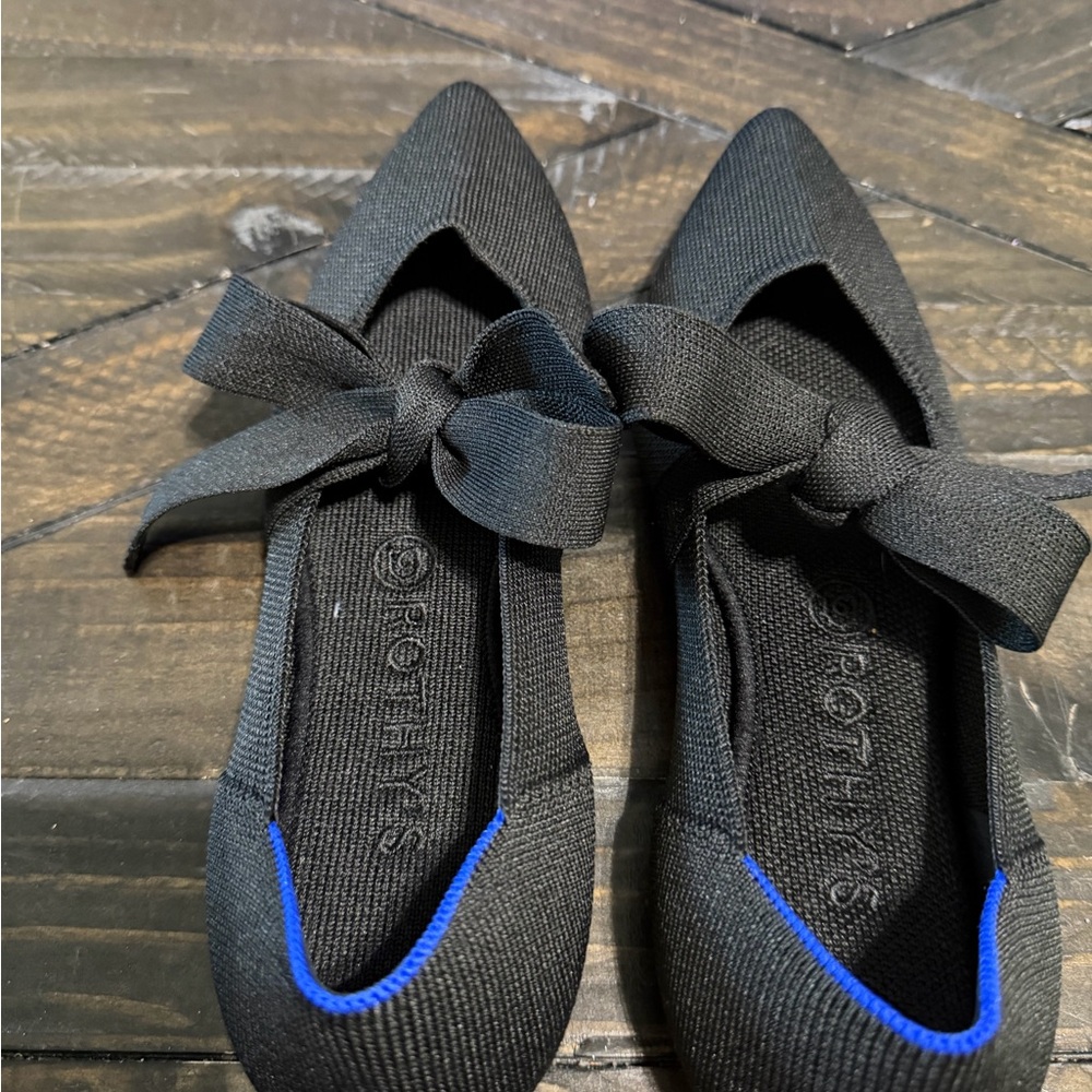 Rothy's Black Flats with Bright Green Insole